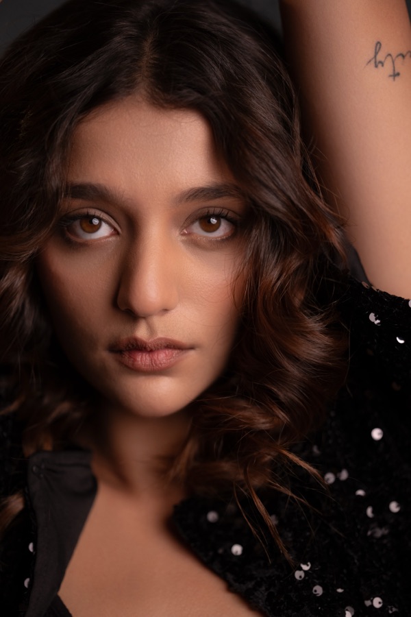 Intense close-up portrait, direct gaze into camera